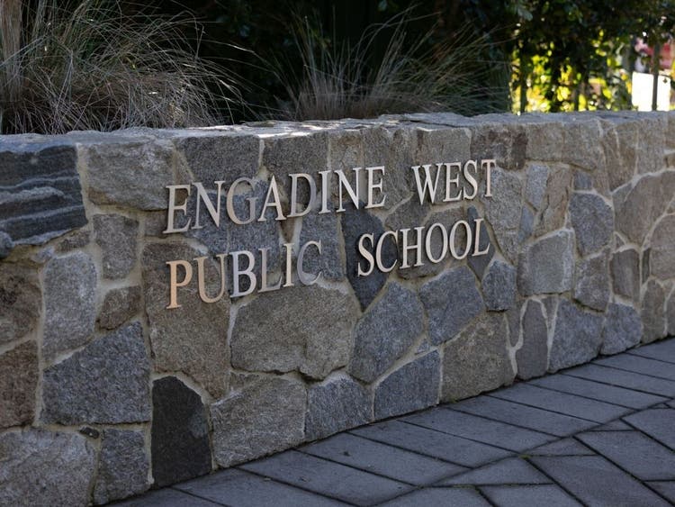 Engadine West Public School written on stone garden wall